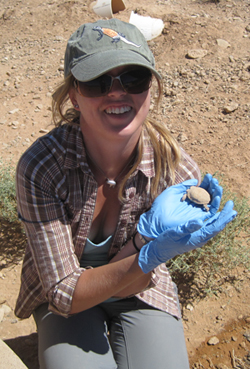 UC Davis graduate student Melia Nafus with a hatchling desert tortoise.