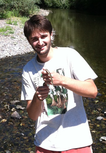 Evan holding a tropical lizard